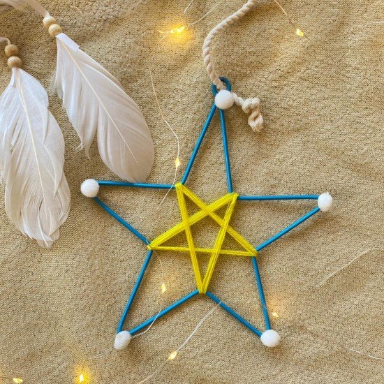 Blue Metal Star With Pom Poms